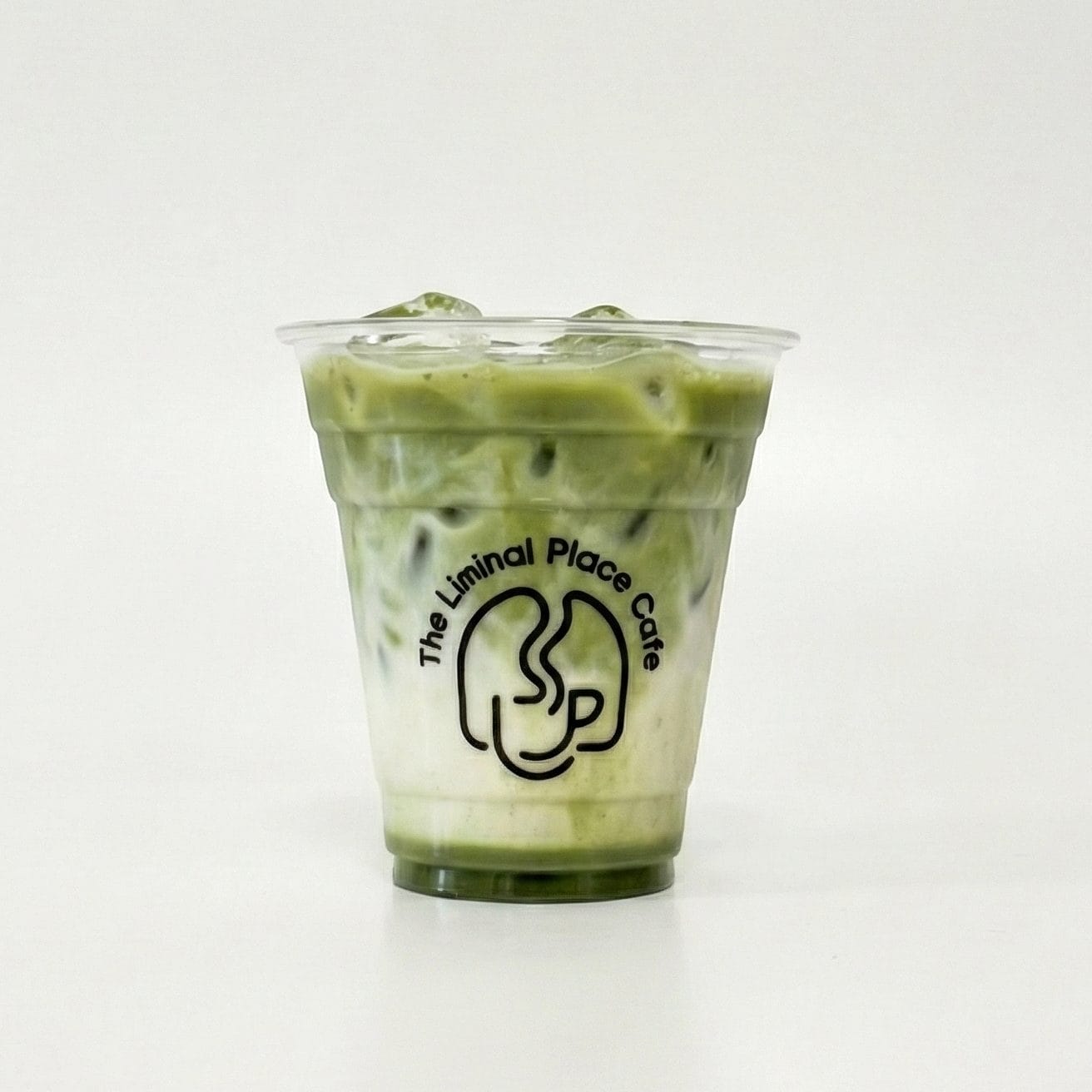 Clear plastic iced matcha latte cup with custom black logo, transparent cold cup for cafe iced beverages