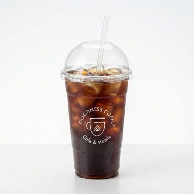 Clear plastic iced coffee cup with dome lid and straw, custom printed Goodness Coffee Cafe and Mobile logo