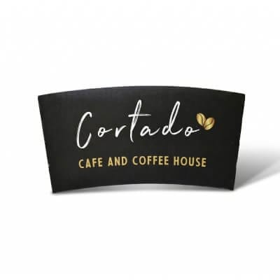 custom black corrugated coffee cup sleeve with Cortado Cafe and Coffee House branding in gold and white